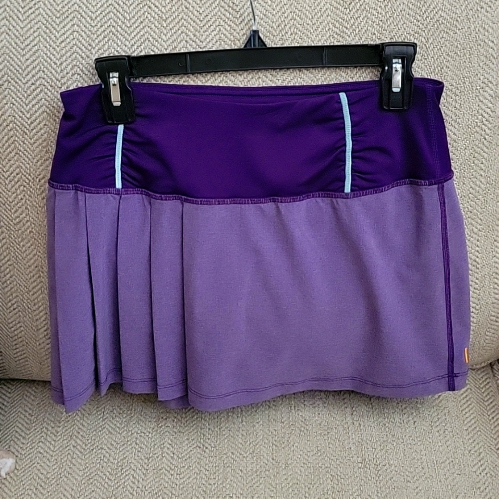 Purple Tennis short, size Small.